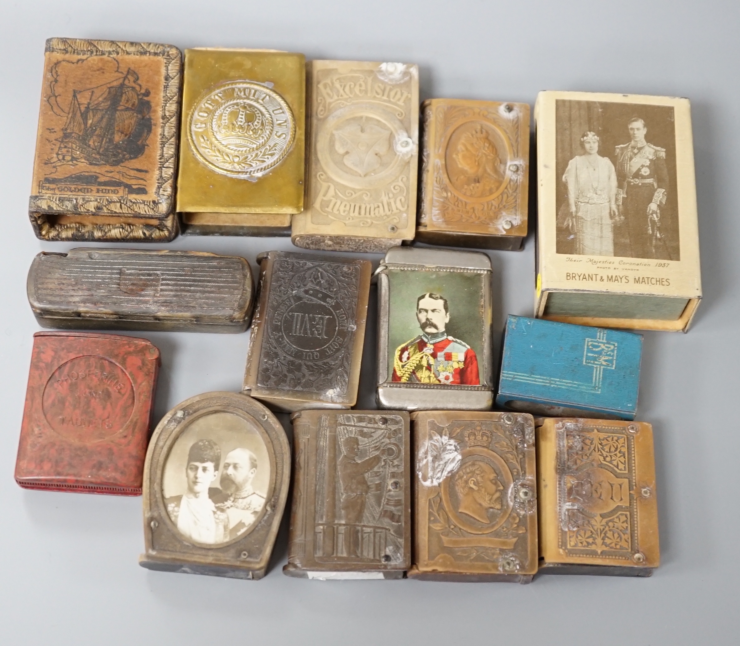 A collection of Victorian and later vestas and matchbox holders, some commemorative